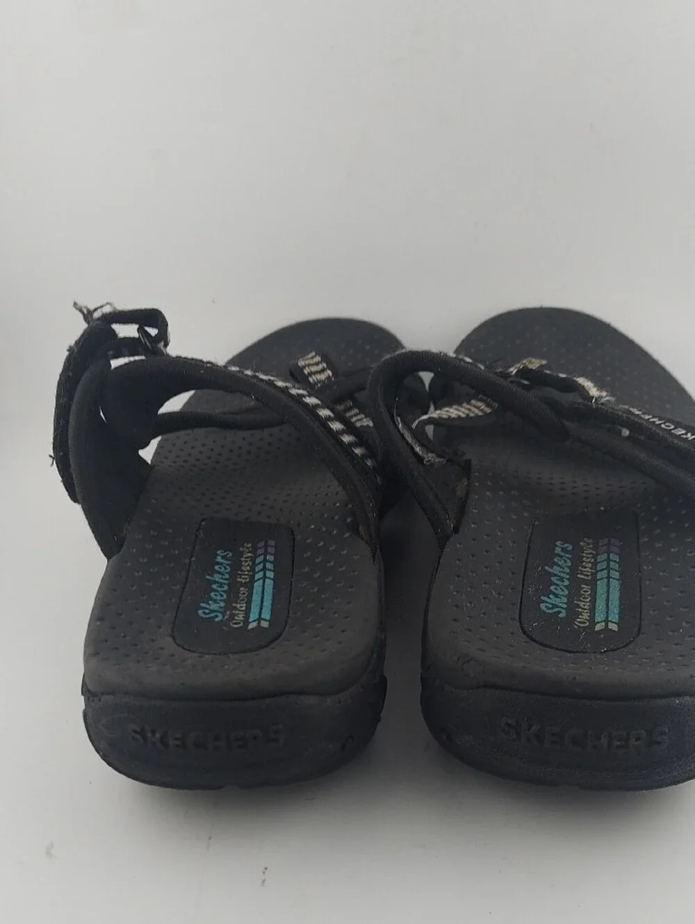 Skechers Womans Black Sandals with White-Striped Webbing